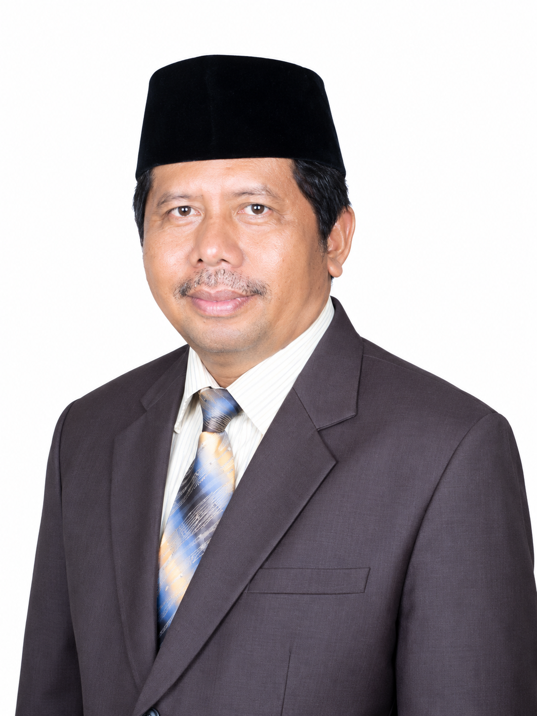 Drs. H. UBIK BAEHAQI (Alm)